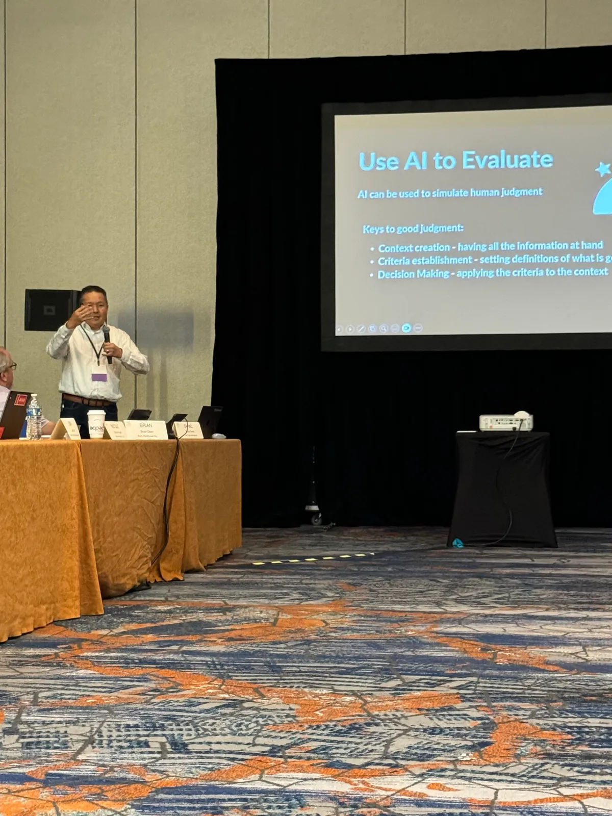 Lauren McCullough on a panel about using AI to evaluate