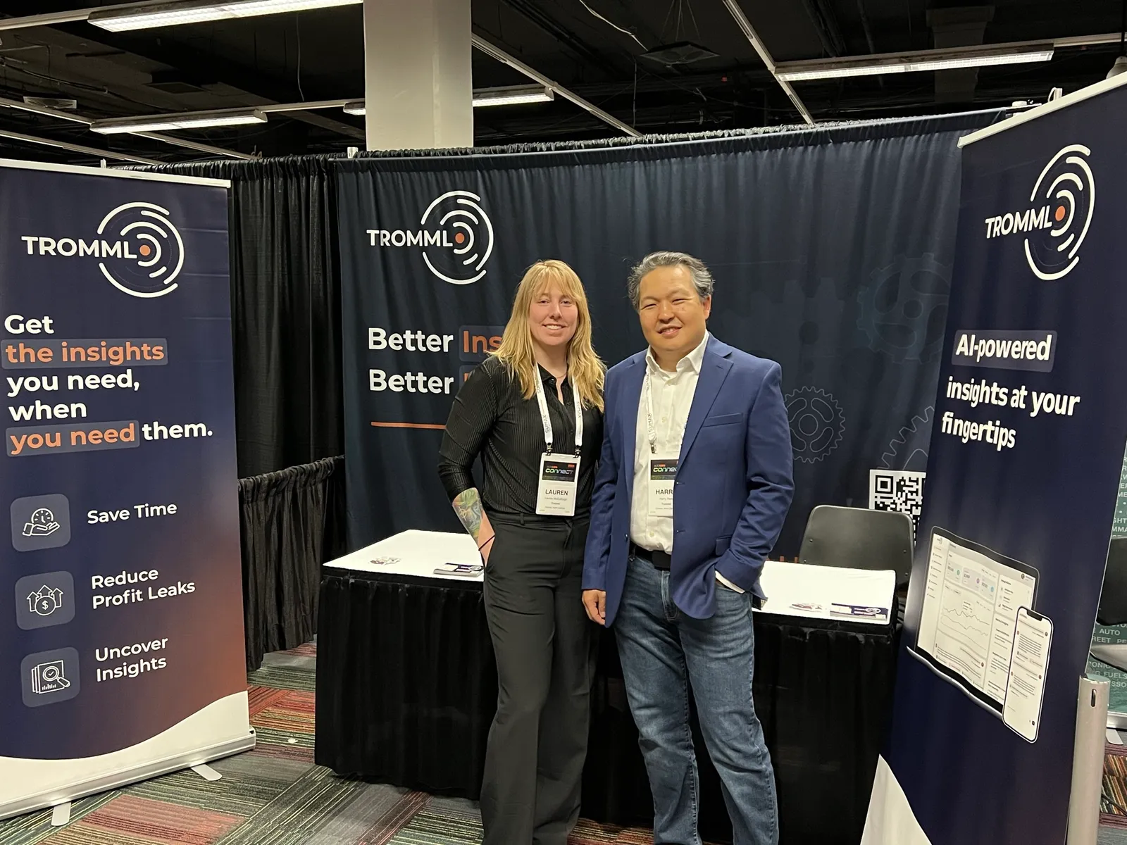 Lauren McCullough and a colleague at the Tromml booth